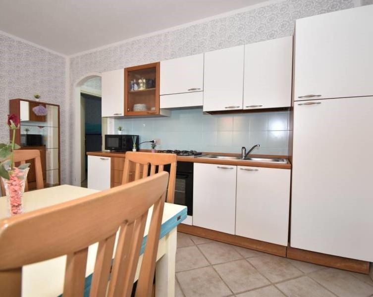 Apartamento Le Residenze Itaca Porto Pozzo Exterior foto